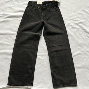 Brand new with tag black pair of baggy straight leg H&M jeans, size 4